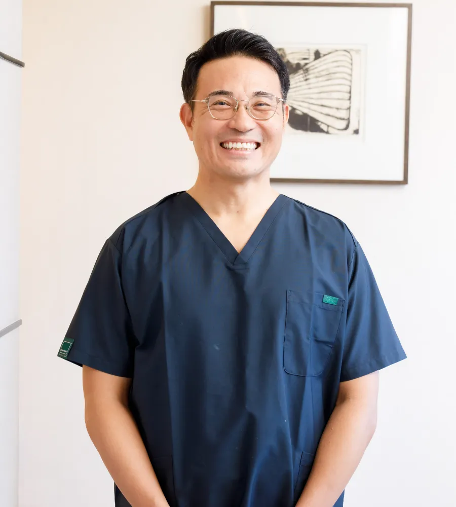 院長　富久 賢哉